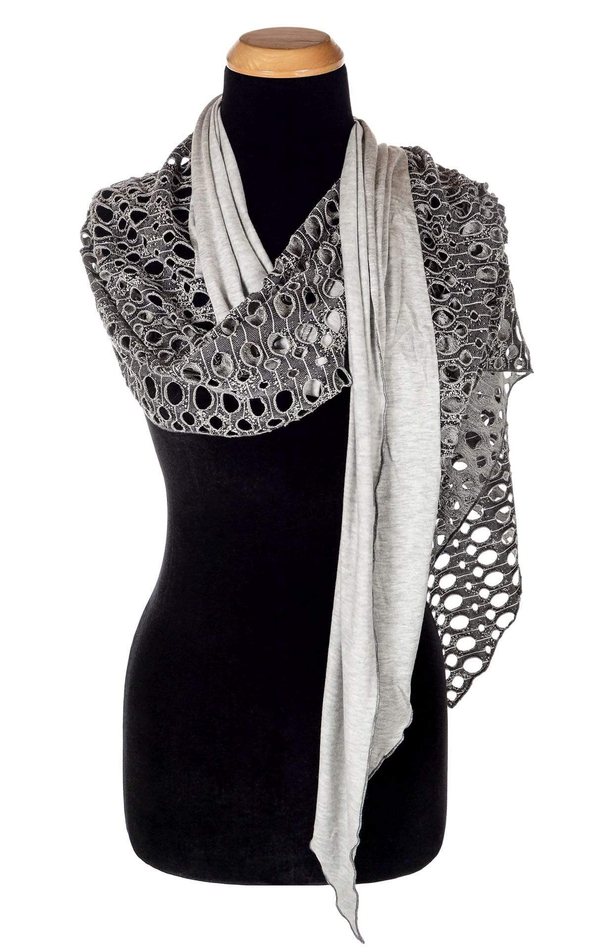 Woman&#39;s Two-Tone Handkerchief Scarf on Mannequin | Lunar Landing, a black and neutral knit with curled edges surrounding holes, paired with a light-weight Silver Gray Jersey Knit | Handmade in Seattle WA | Pandemonium Millinery