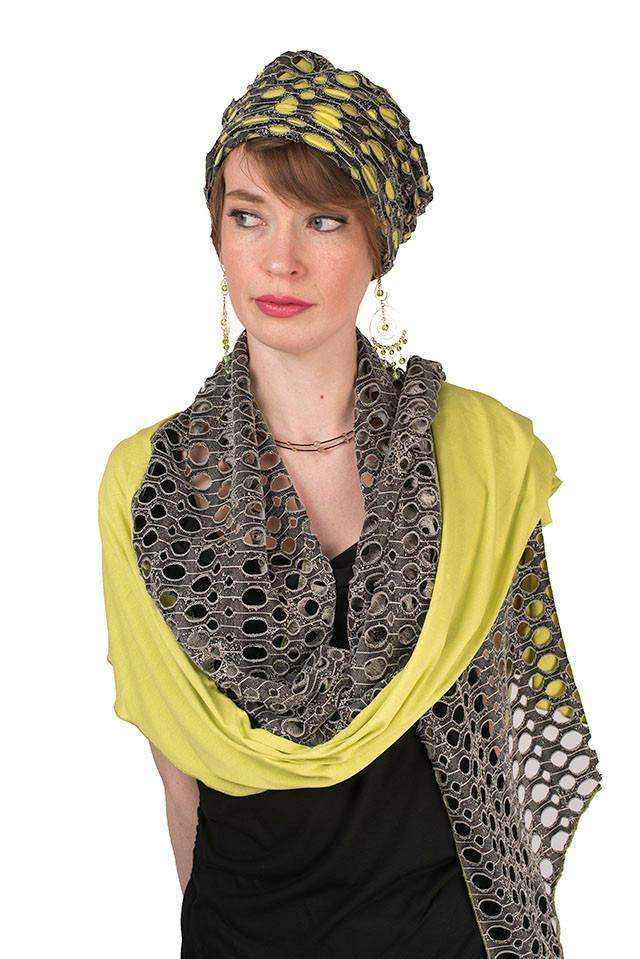 Model wearing Two-Tone Handkerchief Scarf | Lunar Landing, a black and neutral knit with curled edges surrounding holes, paired with a light-weight lime Stardust Jersey Knit | Handmade in Seattle WA | Pandemonium Millinery