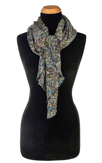 Women’s Large Handkerchief Scarf, Wrap on Mannequin tied in knot | Peacock Paisley Chiffon in blue, greens, and browns | Handmade in Seattle WA | Pandemonium Millinery