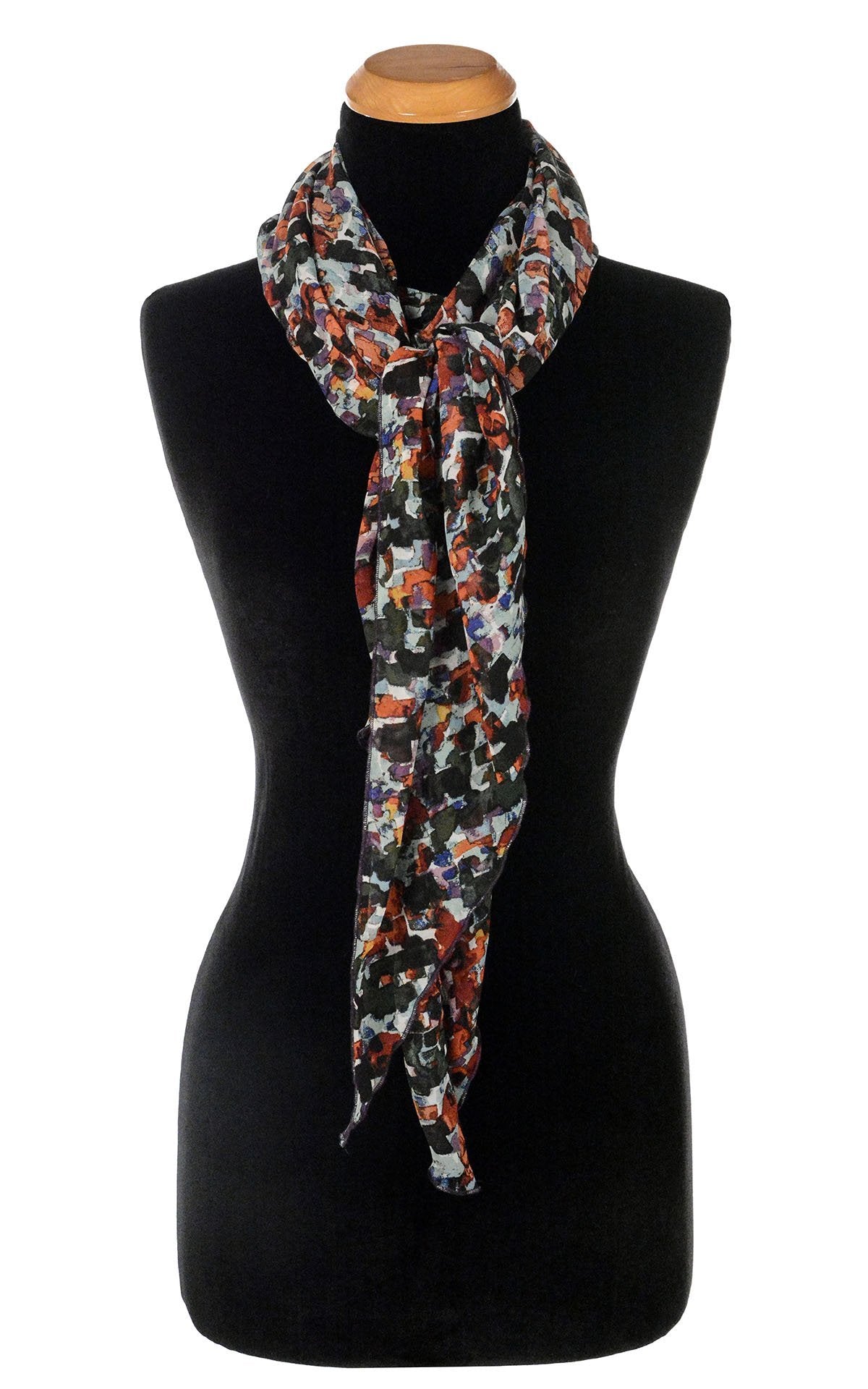 Women’s Large Handkerchief Scarf, Wrap on Mannequin shown tied | Shown in Purple Impression abstract Chiffon print. Blacks, reds creams, green, rust| Handmade in Seattle WA | Pandemonium Millinery