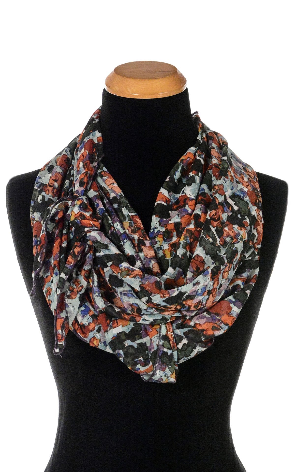 Women’s Large Handkerchief Scarf, Wrap on Mannequin shown tied on side | Shown in Purple Impression abstract Chiffon print. Blacks, reds creams, green, rust| Handmade in Seattle WA | Pandemonium Millinery