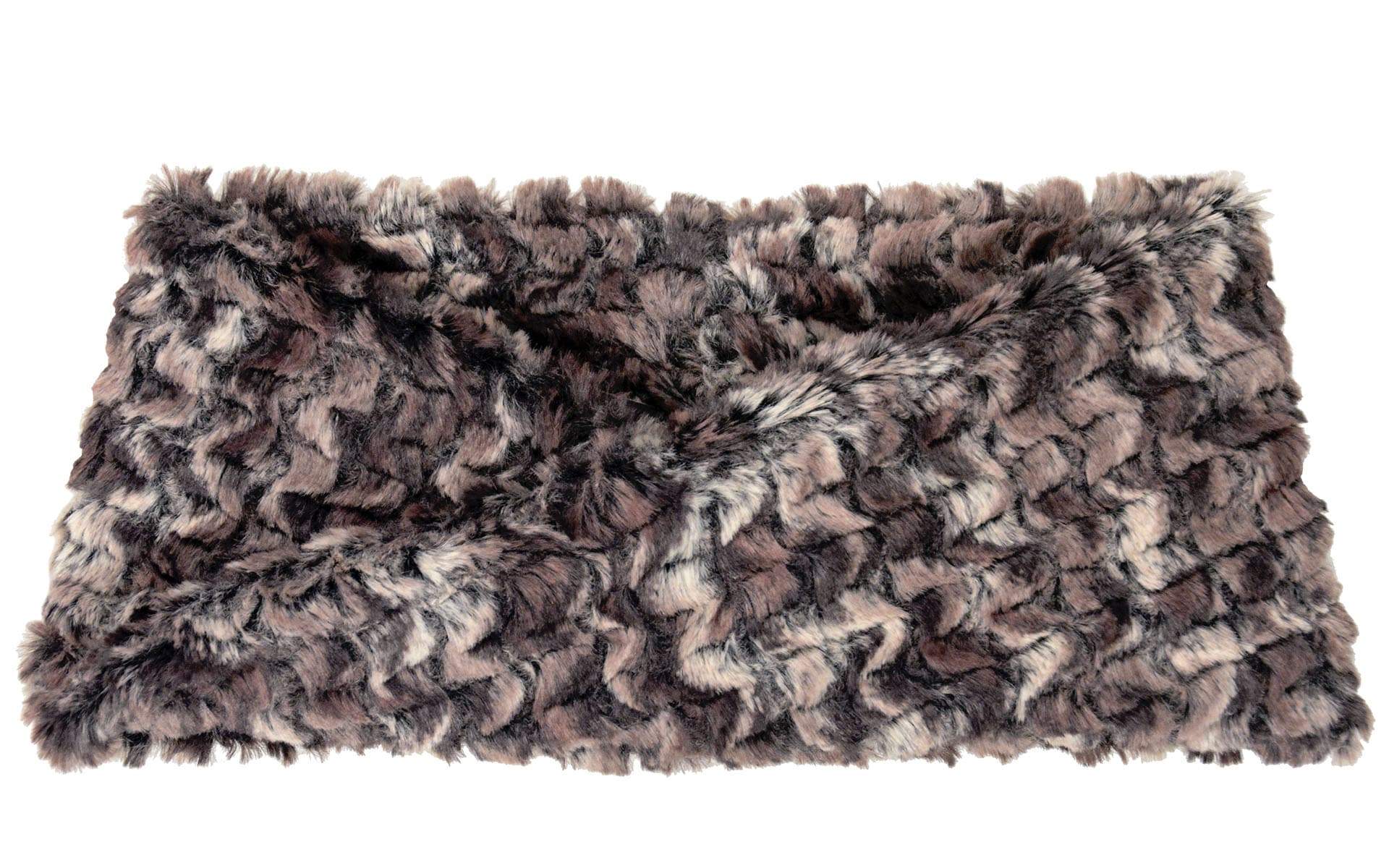 Product shot of Headband, Ear and Neck Warmer with feather trim | Calico, brown, chocolate and Ivory Faux Fur | Handmade by Pandemonium Millinery Seattle, WA USA