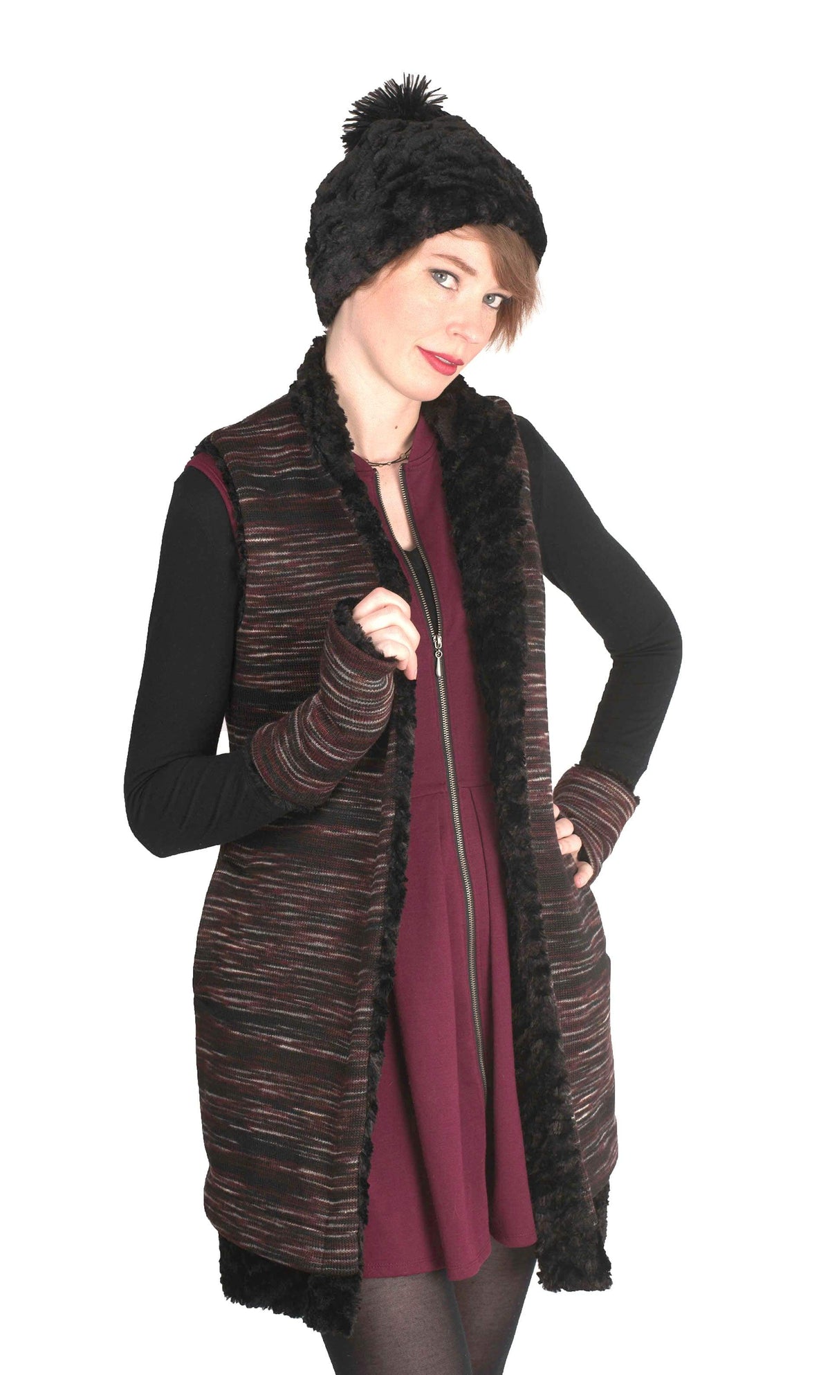 Woman posing in Mandarin Vest Long | Sweet Stripes in Cherry Cordial Knit with Cuddly Black Faux Fur | By Pandemonium Millinery | Handmade in Seattle WA USA