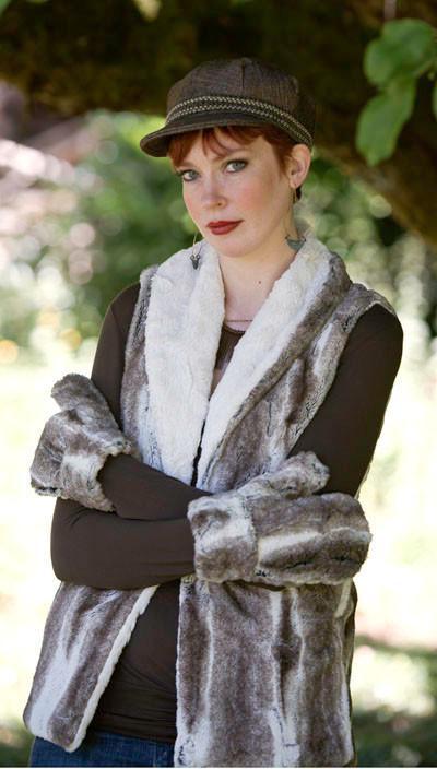 Model wearing matching Valerie Cap Hat, vest and Mittens. Gauntlets, mitts | Birch, cream and brown faux fur | Handmade by Pandemonium Millinery Seattle, WA USA