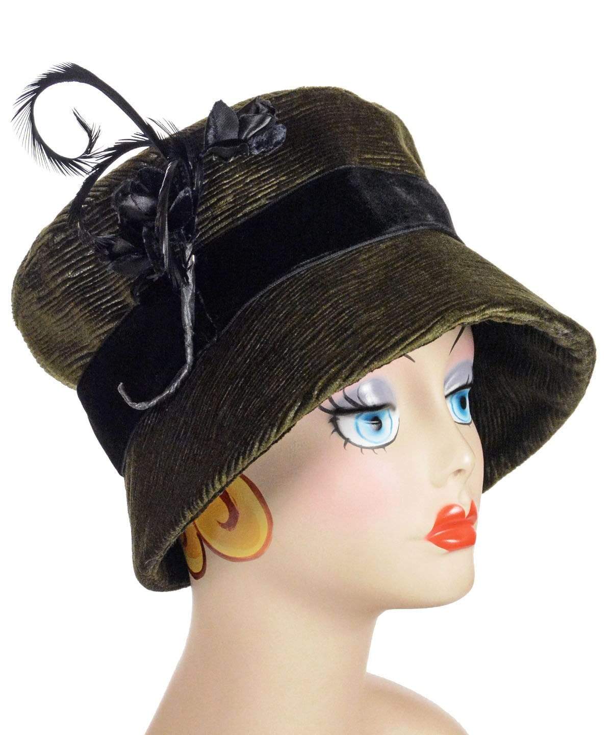 Model wearing Cohen in Olive Upholstery Fabric with Feather and Interconnected Fabric Bow | Handmade By Pandemonium  Millinery | Seattle WA USA