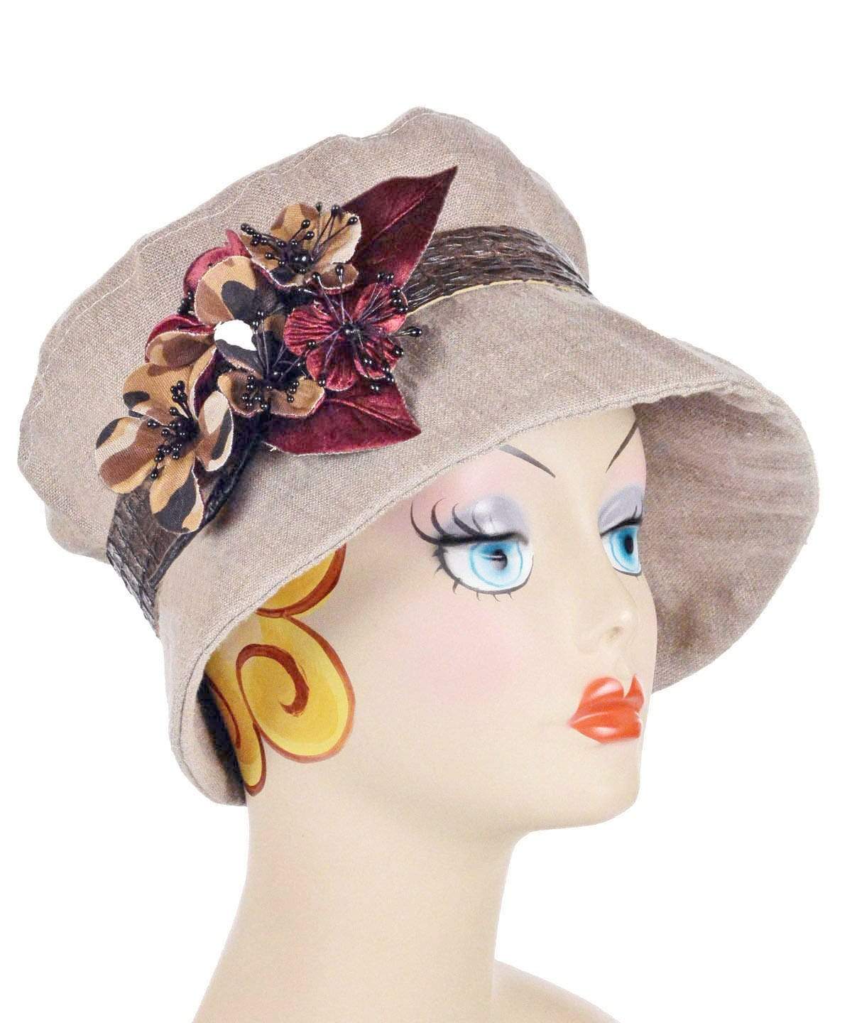 Model wearing Molly Bucket Style Hat Natural Linen with Kimono Silk Floral Band with Large Rust Flower Brooch | Pandemonium Millinery | Handmade in Seattle WA