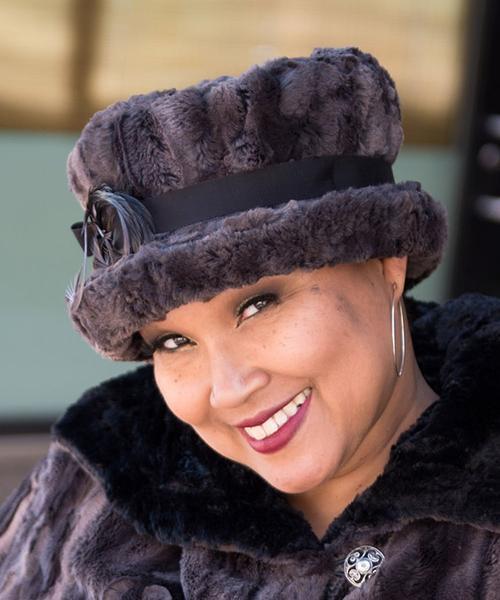 Woman wearing Molly Hat Bucket Style Hat | Luxury Faux Fur In Espresso Bean  | Black Grosgrain Band with Gray Curl Feather Brooch | Handmade by Pandemonium Seattle
