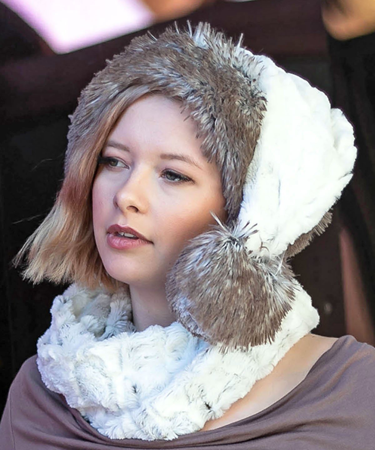Model is wearing a Neck Warmer and matching Santa Hat | Winter&#39;s Frost White and Faint Black spots Faux Fur | Handmade in the USA by Pandemonium Seattle