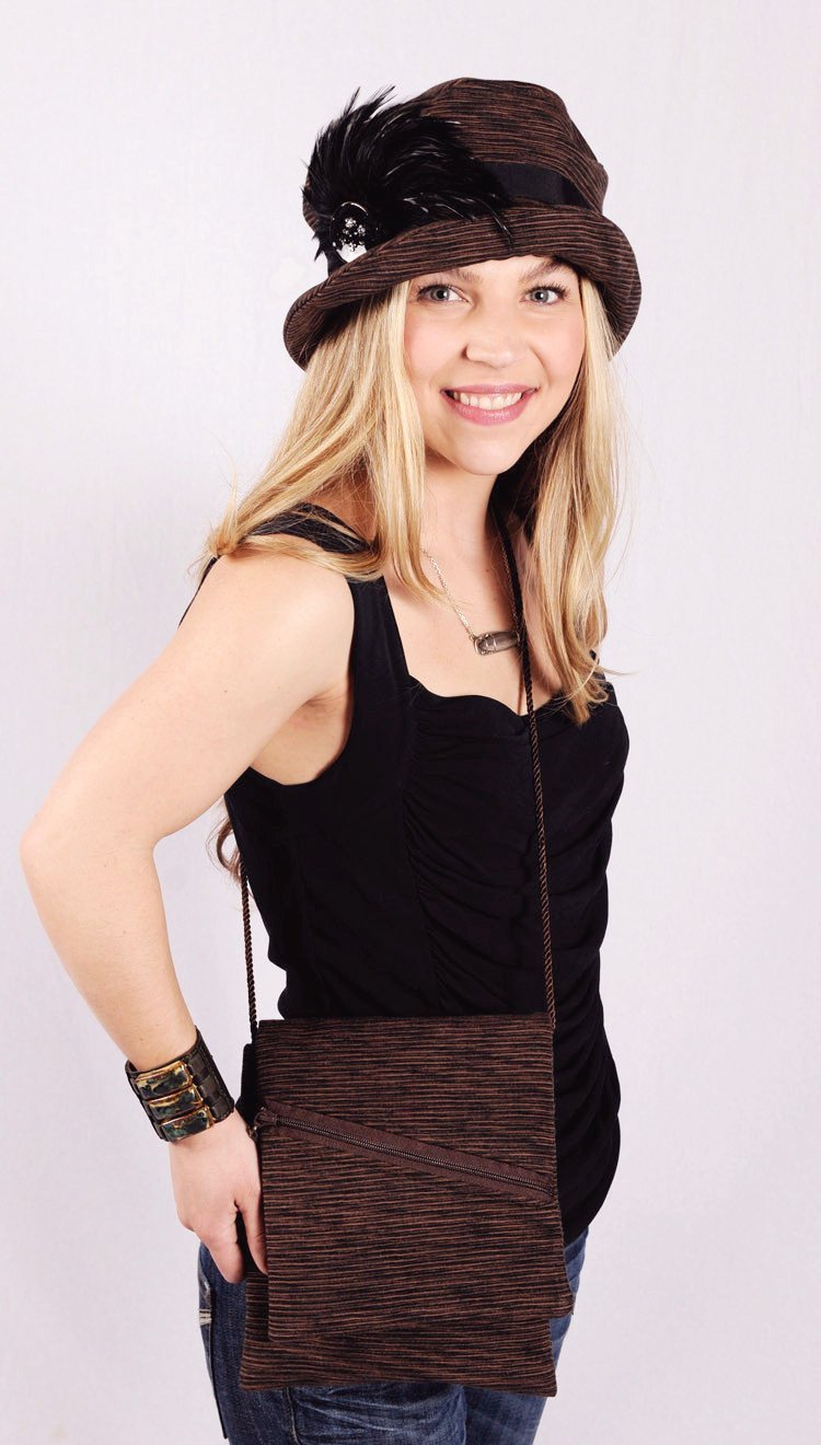 Woman modeling a Prague Handbag | Sonora, Dark Brown Upholstery with Brown Cord Strap | Handmade by Pandemonium Seattle USA |