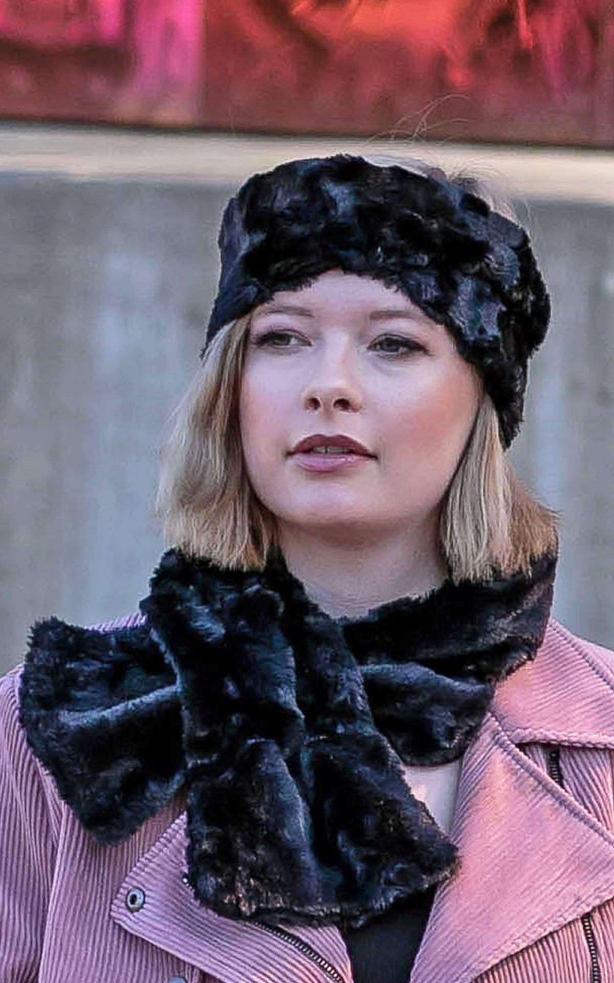 Product shot of Women’s reversible Pull Through Scarf | Savannah Cat Faux Fur Animal Print in black creams and grays with Cuddly Faux Fur in Black| Handmade in Seattle WA | Pandemonium Millinery