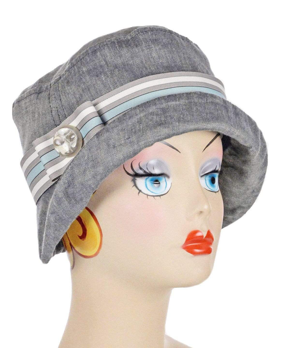 Model wearing Samantha Hat Linen in Juniper |  Beige and Black Band featuring Grizzly Feather Brooch | Handmade By Pandemonium Millinery | Seattle WA