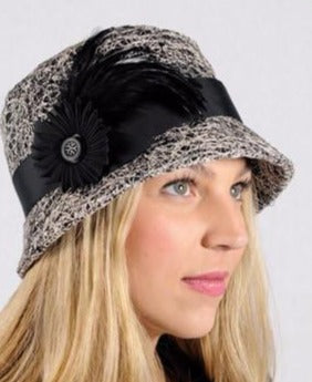 Model wearing Samantha Hat Luna in Black | Black Grosgrain Band with Black Grosgrain and Feather Brooch | Handmade By Pandemonium Millinery | Seattle WA