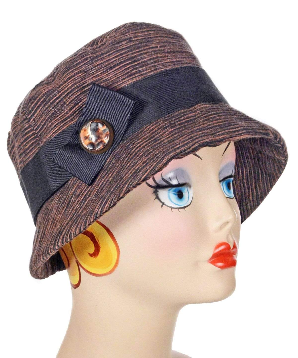 Samantha Hat Sonora Upholstery with Black Grosgrain Band and Carmel Lucite Button| Handmade By Pandemonium Millinery | Seattle WA