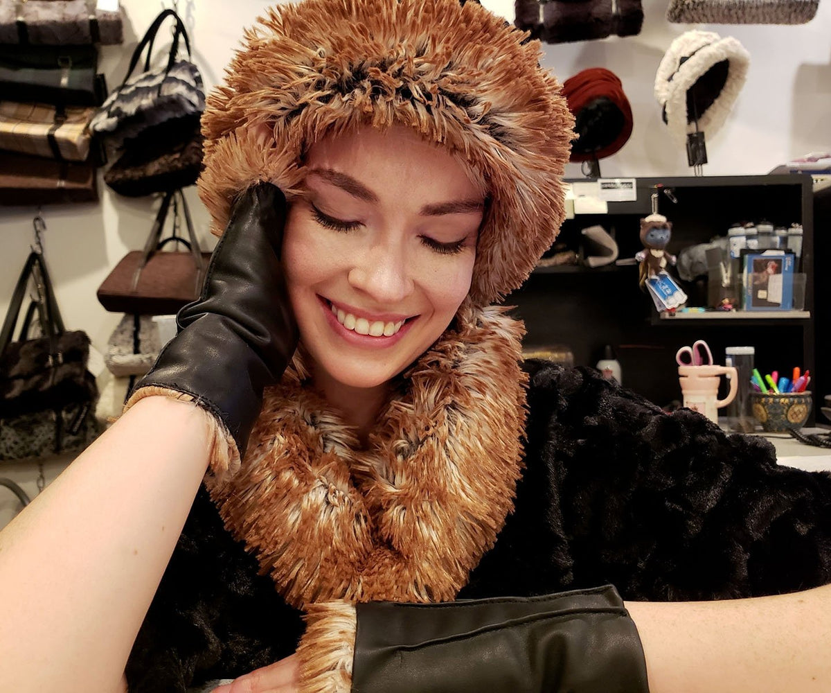 close up of woman sitting at desk wearing a Sweater Top | Cuddly Faux Fur Black with Silver Tip Fox in Black Faux Fur Long Hair Collar | Handmade By Pandemonium Millinery | Seattle WA USA