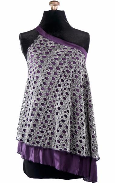 Product shot of Swing Top an asymmetrical top| Lunar Landing, a black and neutral knit with curled edges surrounding holes paired with a lightweight Jersey Knit in Purple | Handmade in Seattle WA | Pandemonium Millinery