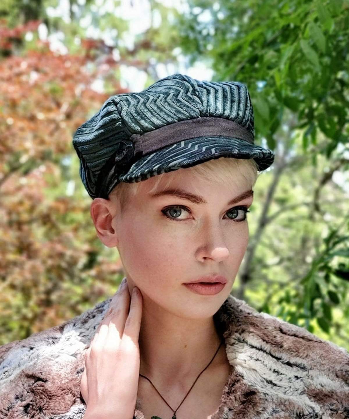 Model wearing Valerie Newspaper Boy Style Hat with Button Trim | Chenille in Bonsai Upholstery| Handmade by Pandemonium Millinery | Seattle WA