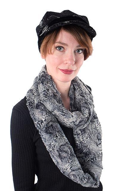 Model wearing Pandemonium Millinery | Valerie Cap Style | Hat Fabric is Crop Circle Upholstery Fabric| Spiral Metal Button Trim | Featuring a Nimbus Faux Fur ScarfHandmade in Seattle  WA  USA