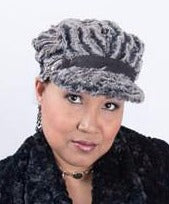 Model is wearing a Valerie Hat Desert Sand in Charcoal with Buckle by Pandemonium Millinery. Handmade in Seattle WA USA.