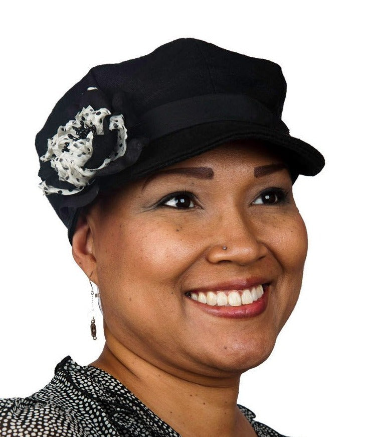 Model wearing Valerie Newsboy Style Cap |  Linen in Black | Black and White Floral Brooch | Handmade By Pandemonium Millinery | Seattle WA USA