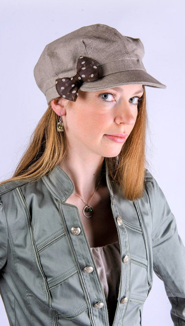 Woman wearing Valerie Style Cap | Linen in Natural | Brown and Cream Polka Dot Bow Trim| Handmade USA by Pandemonium Seattle