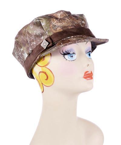 Woman wearing Valerie Cap in Renaissance in Everglade Upholstery Fabric and Chocolate with Metal Button | Handmade in Seattle WA USA by Pandemonium Millinery |  hat, newsboy, apple cap Style 