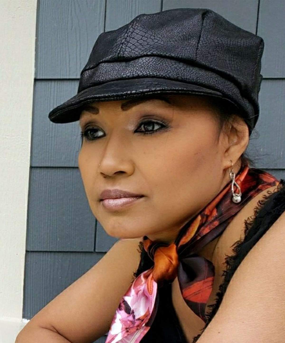 Model wearing Newsboy Style Hat | Outback in Back Faux Leather  | Handmade in Seattle WA USA by Pandemonium Millinery