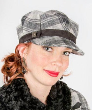 Model wearing Valerie Cap  Style Hat | Wool Plaid in Twilight with Black Faux Suede Band | Metal Button Trim | Handmade By Pandemonium Millinery | Seattle WA