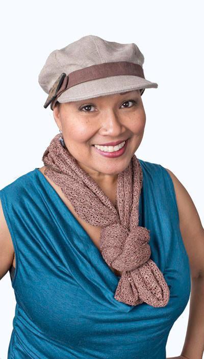 Model wearing a Valerie Cap style hat and a Wide Infinity Loop Scarf  tied in knot | Glitzy Glam in Toffee, an open-weave knit with delicate sequins throughout, Brown, Tan | Handmade in Seattle WA | Pandemonium Millinery