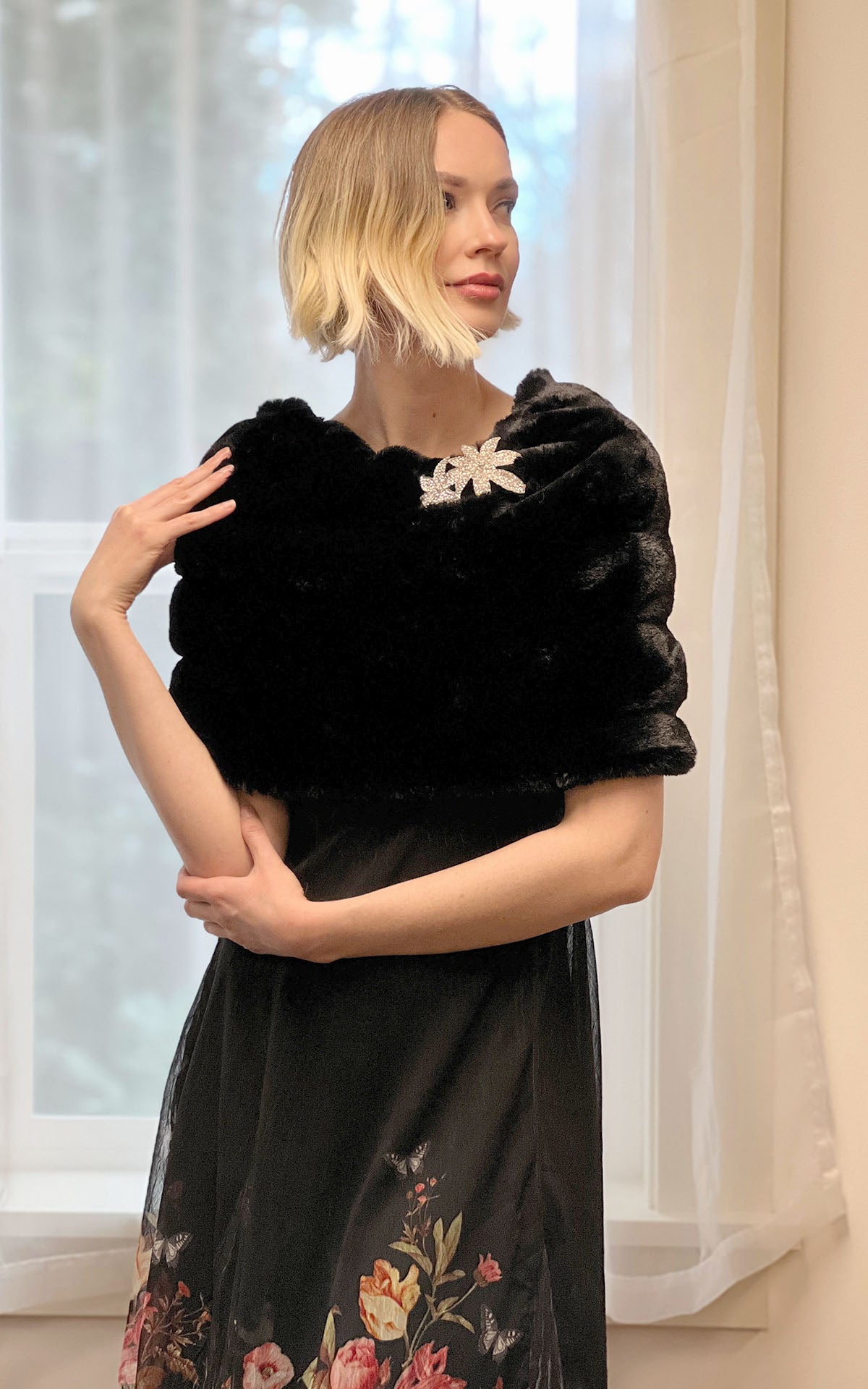Model wearing Royal Opulence Onyx Faux Fur Shoulder Wrap by Pandemonium Seattle.