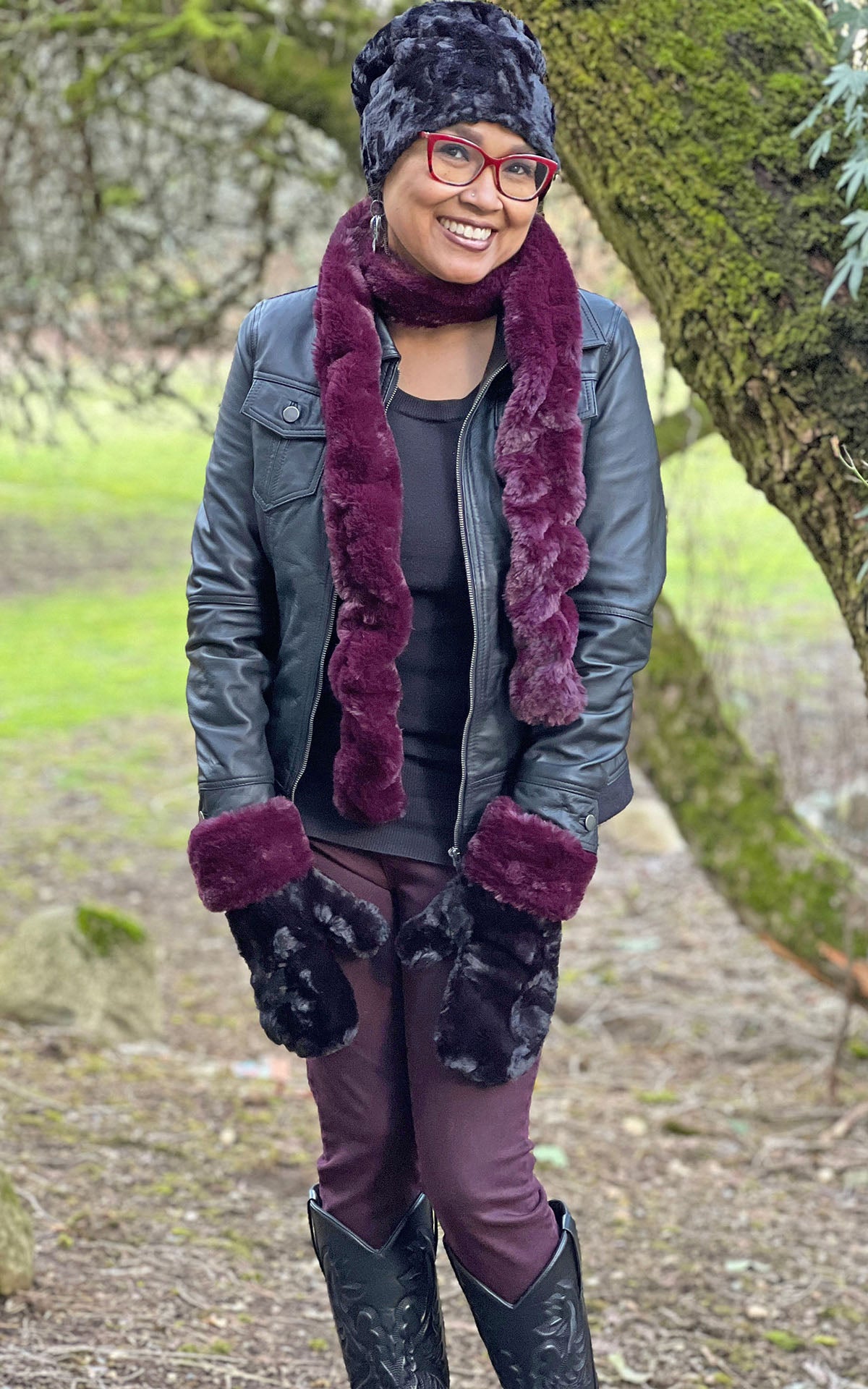 Woman wearing the Royal Opulence Skinny Scarf in Merlot, with matching Merlot Mittens with Cuddly Black. Her Hat is a Cuffed Pillbox in Cuddly Black. Handmade by Pandemonium Seattle.