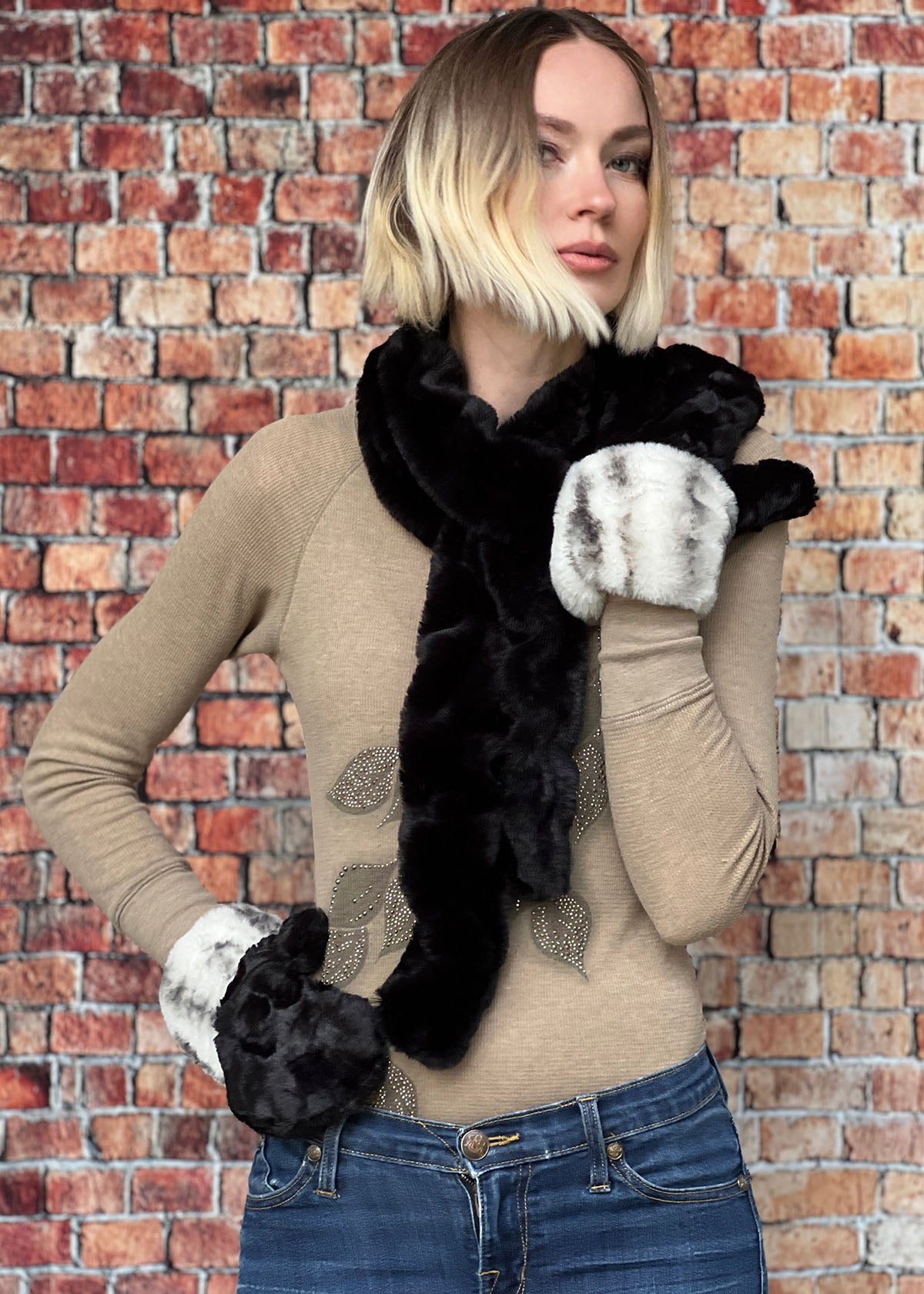Woman wearing the Royal Opulence Skinny Scarf in Onyx with Royal Opulence Mittens in Snow Leopard Cuffs with Cuddly Black Faux Fur. Handmade by Pandemonium Seattle.