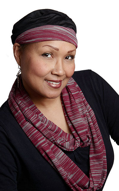 Woman modeling Rowdie Hat and Infinity Scarf in Reflections Sunset