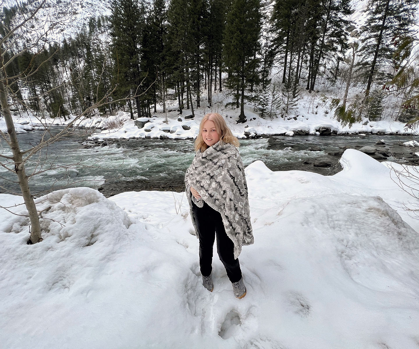 Throw Blanket on woman standing in front of mountain lake | Rainier Sky Luxury Faux Fur | Handmade in WA, USA by Pandemonium Seattle