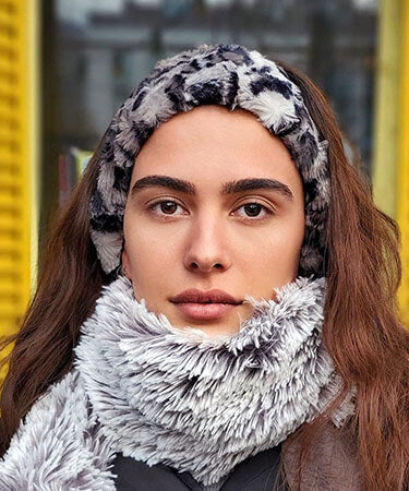 Product shot of Headband, Ear and Neck Warmer | Savanna Cat , Black and Gray Faux Fur | Handmade by Pandemonium Millinery Seattle, WA USA